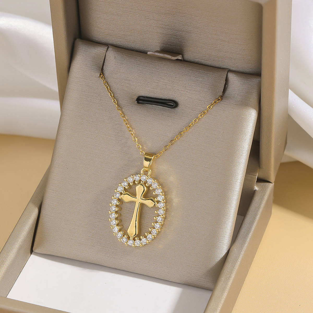 Elegant Oval Cross Necklace with Crystal Halo