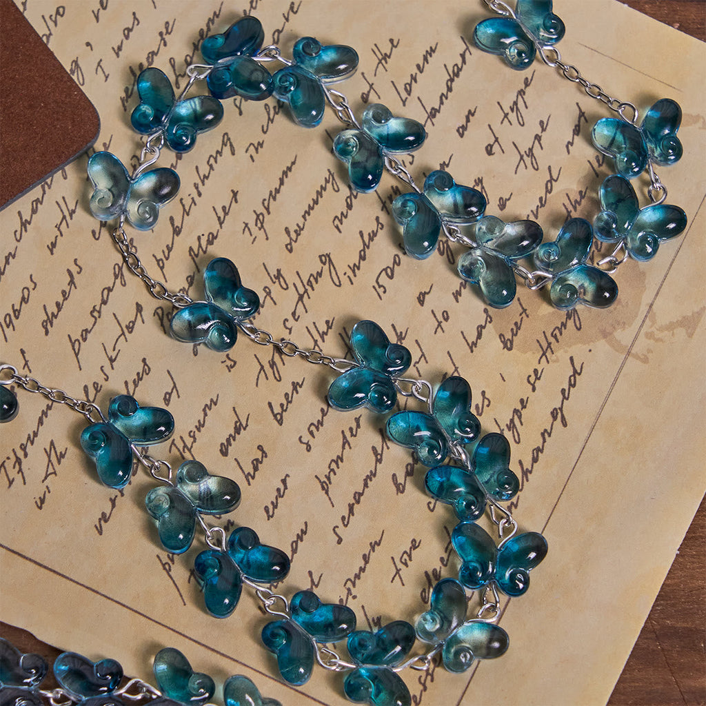 Wings of Devotion Shimmering Blue Butterfly Prayer Bracelet, Animal