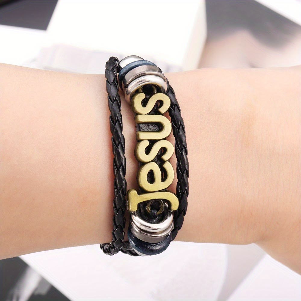 Two-Tone Jesus Charm Bracelet on Black Braided Leather