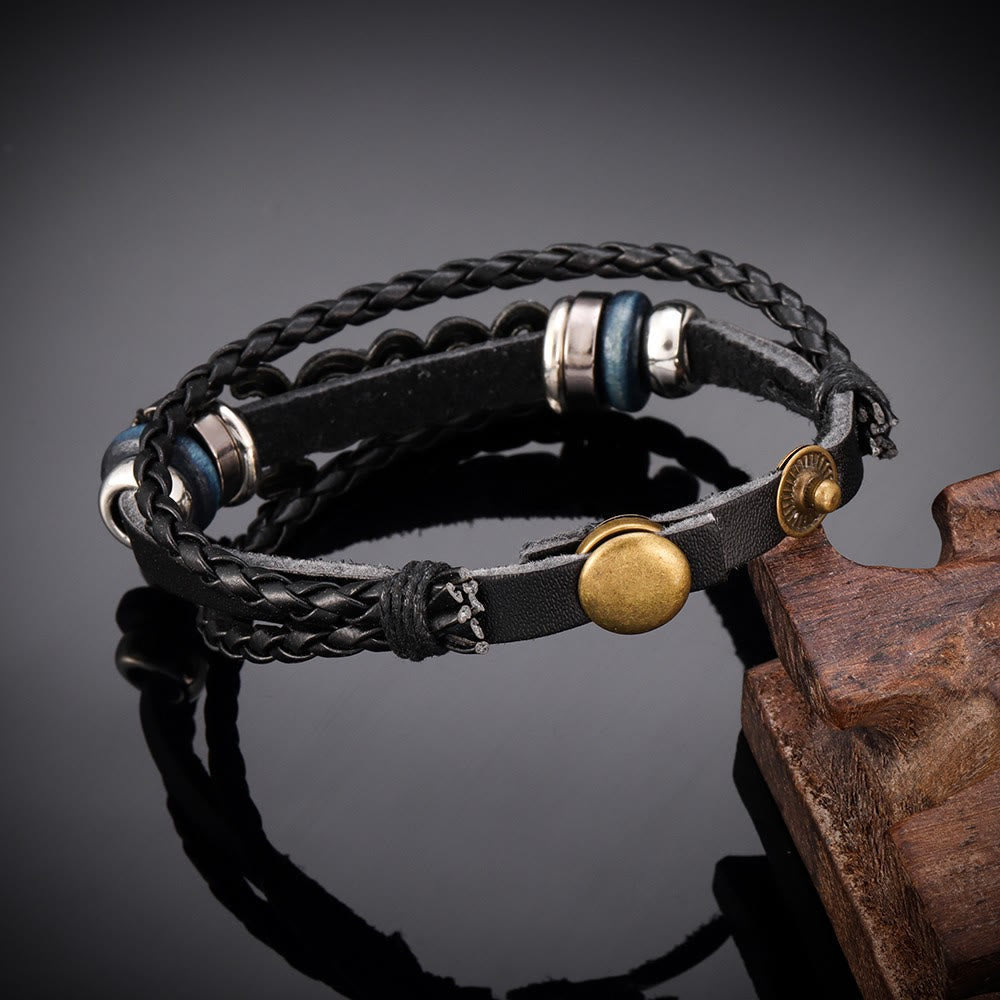 Two-Tone Jesus Charm Bracelet on Black Braided Leather