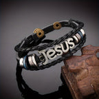 Two-Tone Jesus Charm Bracelet on Black Braided Leather