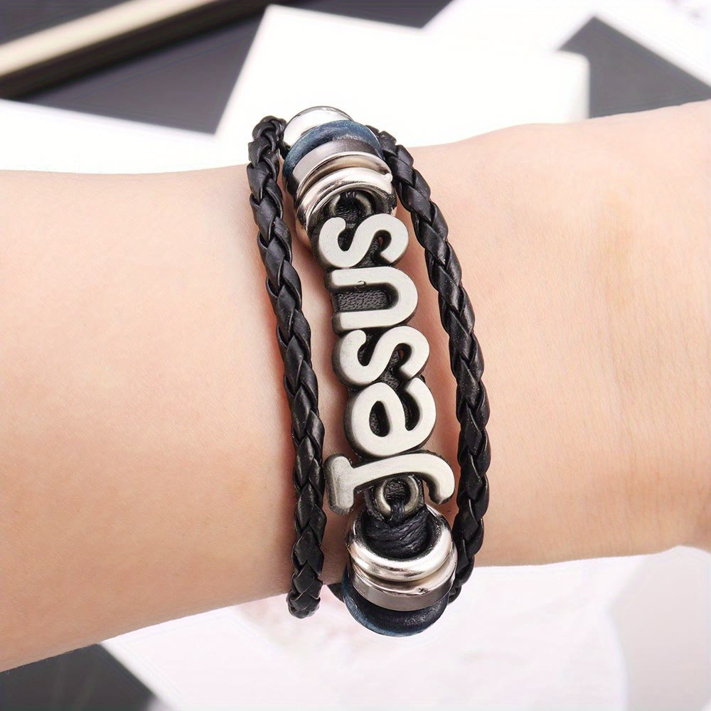 Two-Tone Jesus Charm Bracelet on Black Braided Leather
