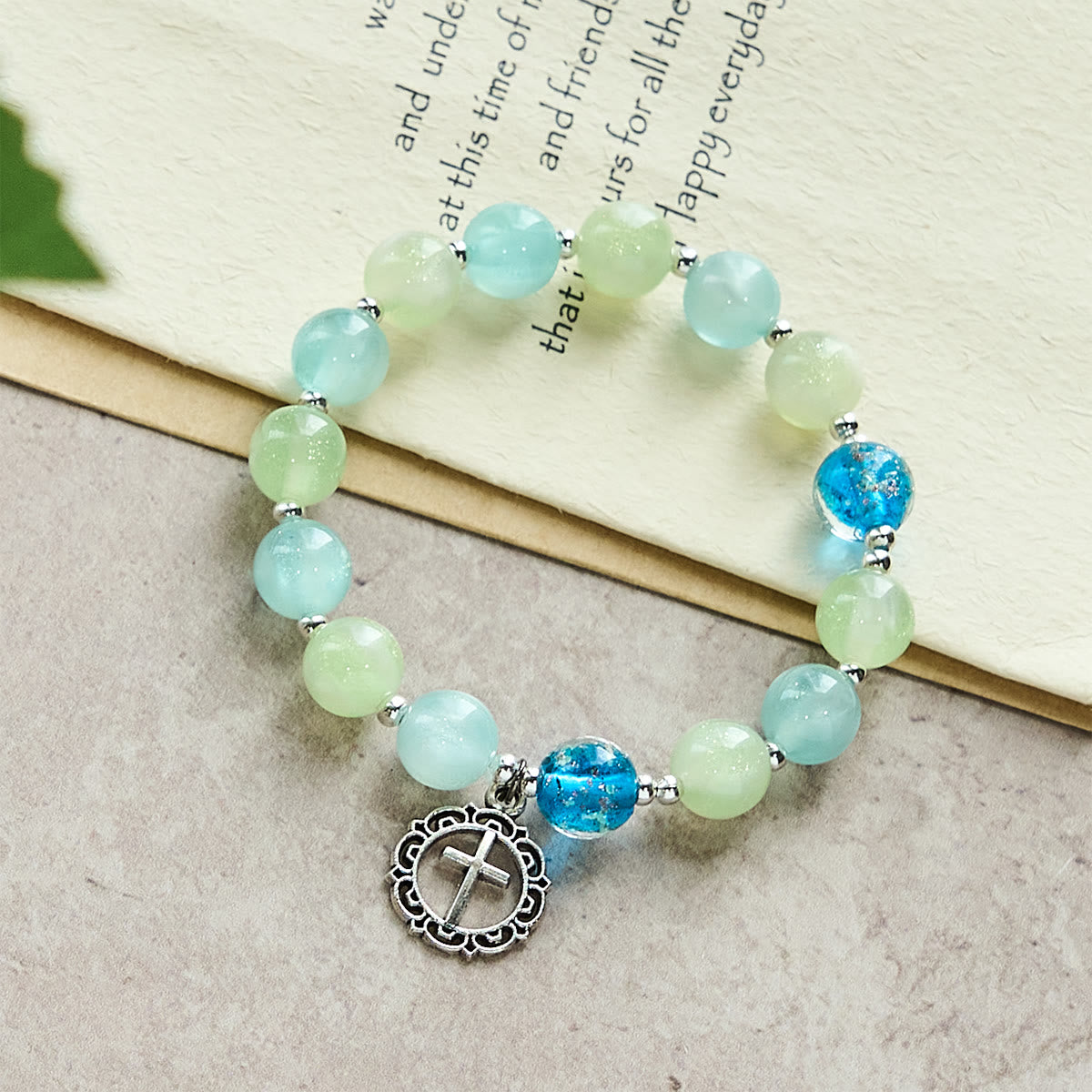 UV-Changing Glitter Bead Bracelet with Ornate Cross