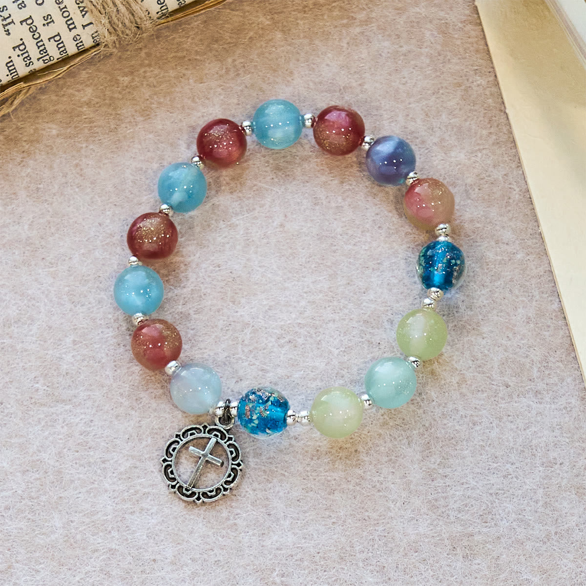 UV-Changing Glitter Bead Bracelet with Ornate Cross