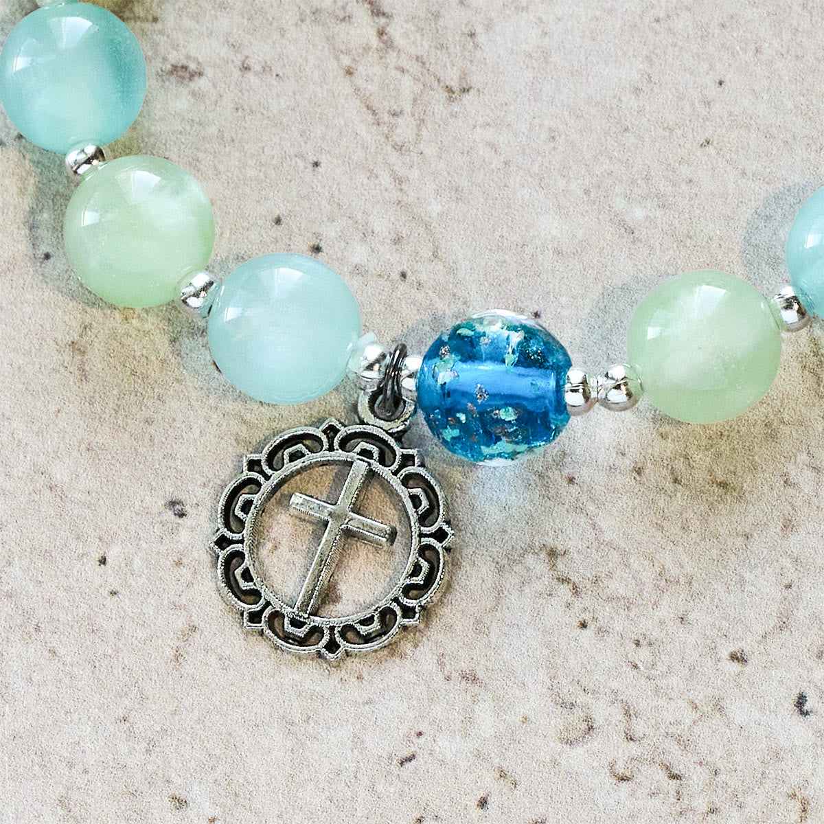 UV-Changing Glitter Bead Bracelet with Ornate Cross