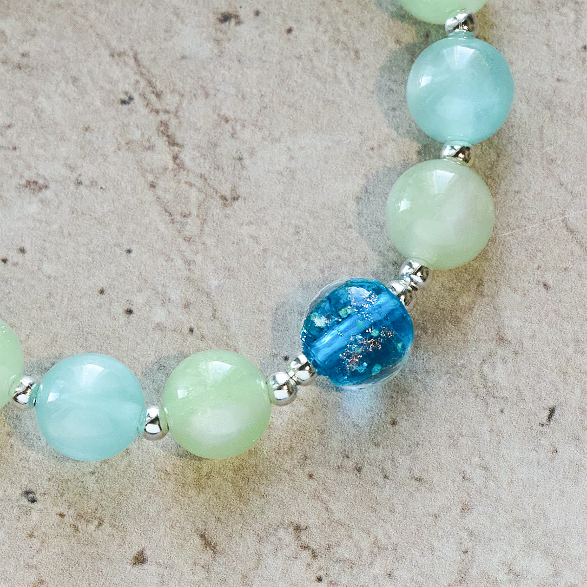 UV-Changing Glitter Bead Bracelet with Ornate Cross