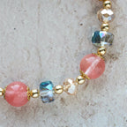 Pink Crystal & Multi-Faceted Bead Bracelet with Golden Crucifix