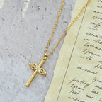 Möbius Cross & Zircon Necklaces