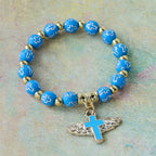 Winged Cross Charm Bracelet