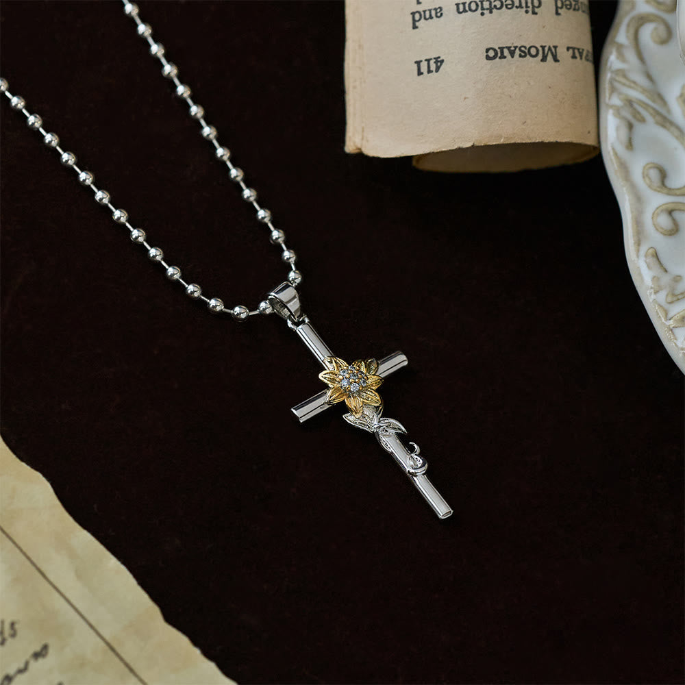 Silver-Toned Cross Pendant Necklace with Golden Floral & Leaf
