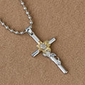 Silver-Toned Cross Pendant Necklace with Golden Floral & Leaf