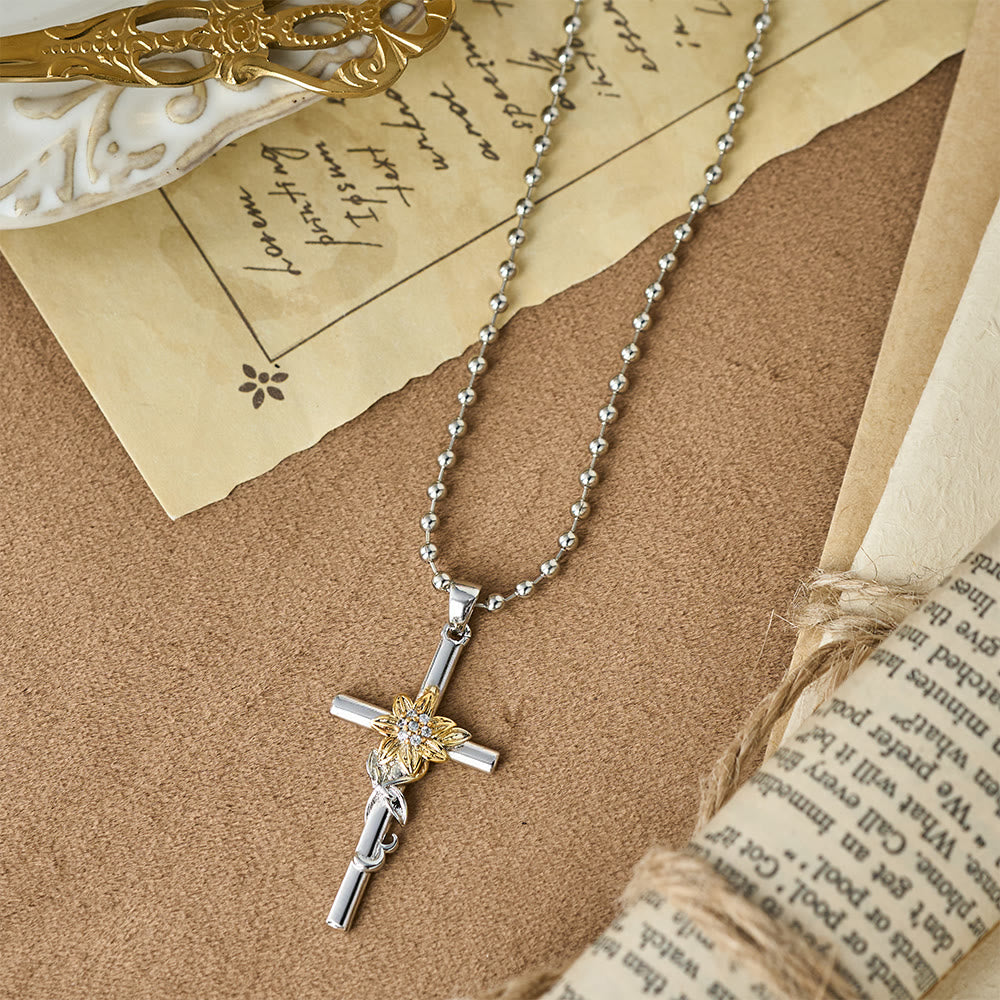 Silver-Toned Cross Pendant Necklace with Golden Floral & Leaf